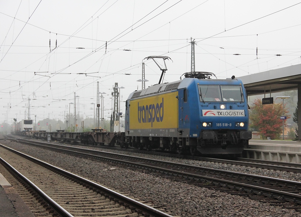 185 518-8 ist mit einem Aufliegerzug fr TXL in Richtung Sden unterwegs!
Aufgenommen am 28.09.2011 in Eichenberg auf Gleis 1

