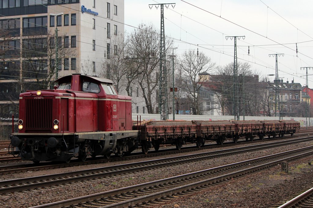 212 047-5 der EfW mit Altschienenzug in Kln West am 27.02.2012