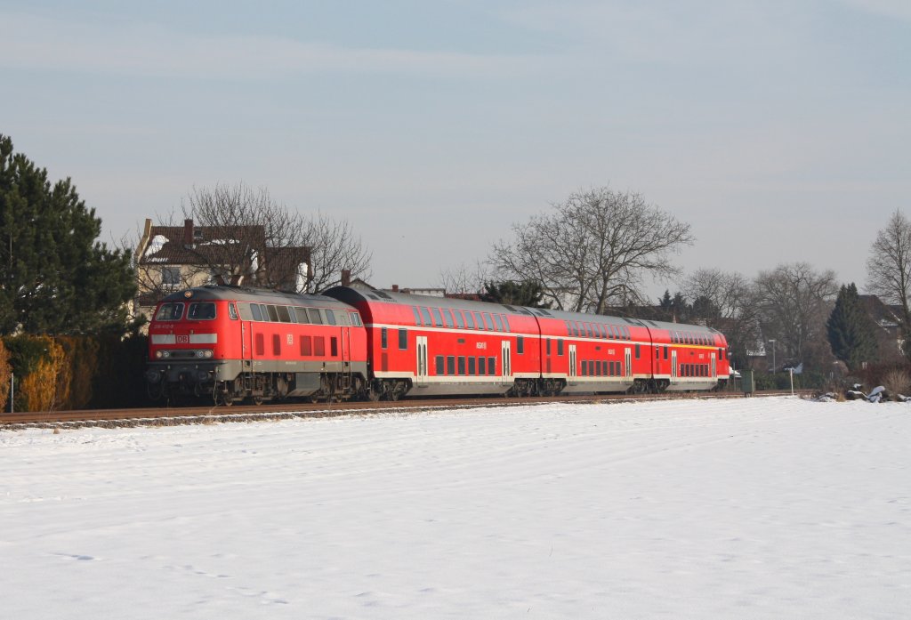 218 412 mit RE 12049 von Worms nach Mainz.Aufgenommen am 05.01.11 bei Pfeddersheim. 

