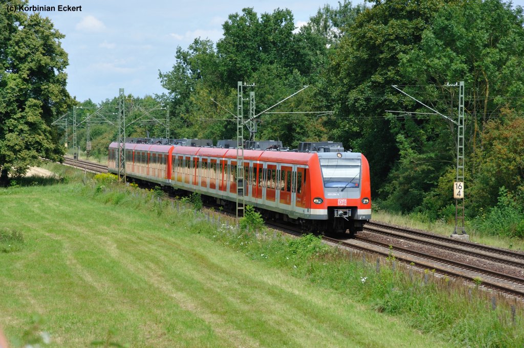 423 234-4 mit der S1 von Freising/Flughafen nach Ostbahnhof bei Feldmoching, 10.08.2011