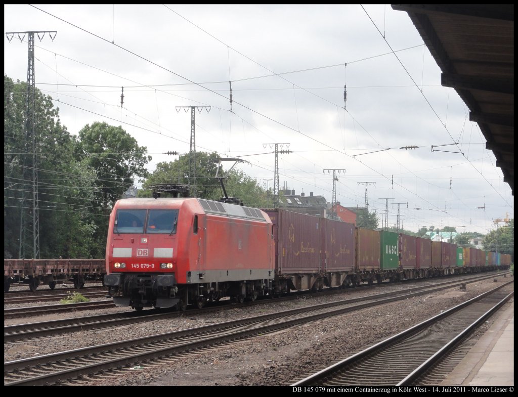 DB 145 079 mit einem Containerzug in Kln West (14.07.2011)