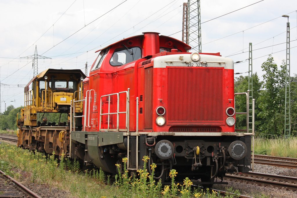 DB Services 212 323 am 4.7.12 mit einem SLW in Ratingen-Lintorf.