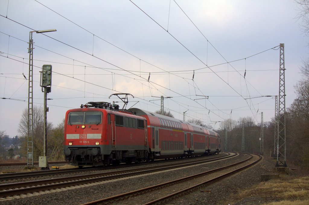 Die 111 126-9 am 25.02.2012 mit dem RE4 (Dortmund Hbf - Aachen Hbf) in Kohlscheid.