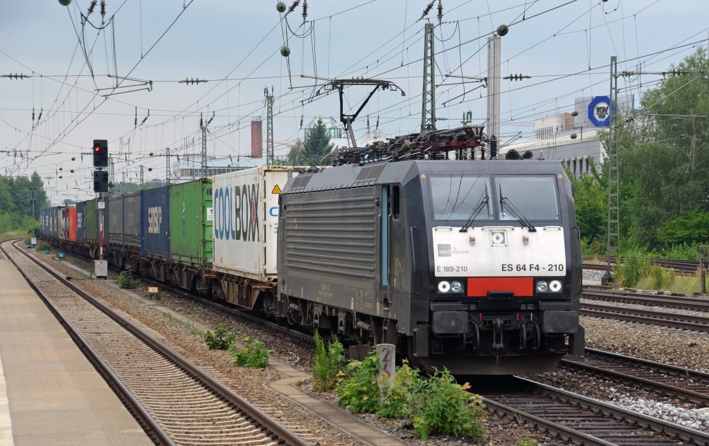 Die fr ERS Railways fahrende ES 64 F4 - 210 zog am 03.07.12 einen Containerzug aus Mnchen-Laim kommend vorbei am Heimeranpatz Richtung Mnchen Ost.