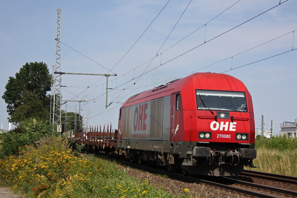 OHE 270080 am 13.8.12 mit einem Stahlzug zur Friedrichs Wilhelms Htte bei der Durchfahrt durch Porz Wahn.