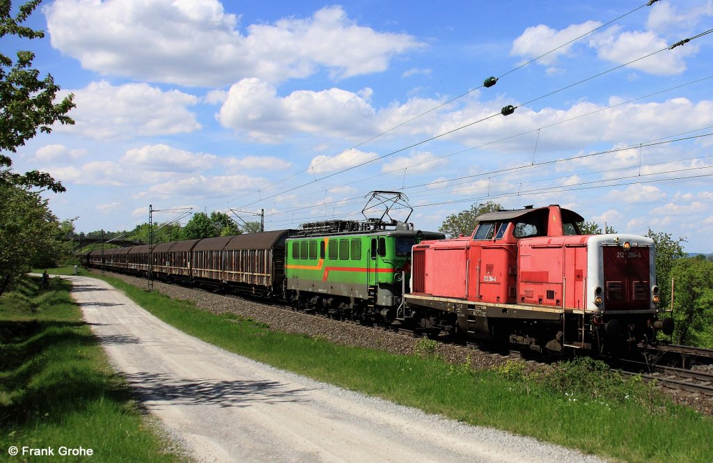 V 100 BayBa 212 284-4 ex DB V 100 2284 ( Bj. 1965 MaK ) + 142 130-4 DP 68 vor   Henkelzug  , Ganzzug der Firma Henkel / Schwarzkopf, KBS 920 Wrzburg - Treuchtlingen, fotografiert bei Burgbernheim am 08.05.2012 --> Die 212 284 befindet sich seit 2008 bei der BayernBahn Betriebsgesellschaft mbH Nrdlingen, einer Tochtergesellschaft des Bayerischen Eisenbahnmuseums e.V., die DP 68 wird von der Deutschen Privatbahn GmbH an die BayBa vermietet.