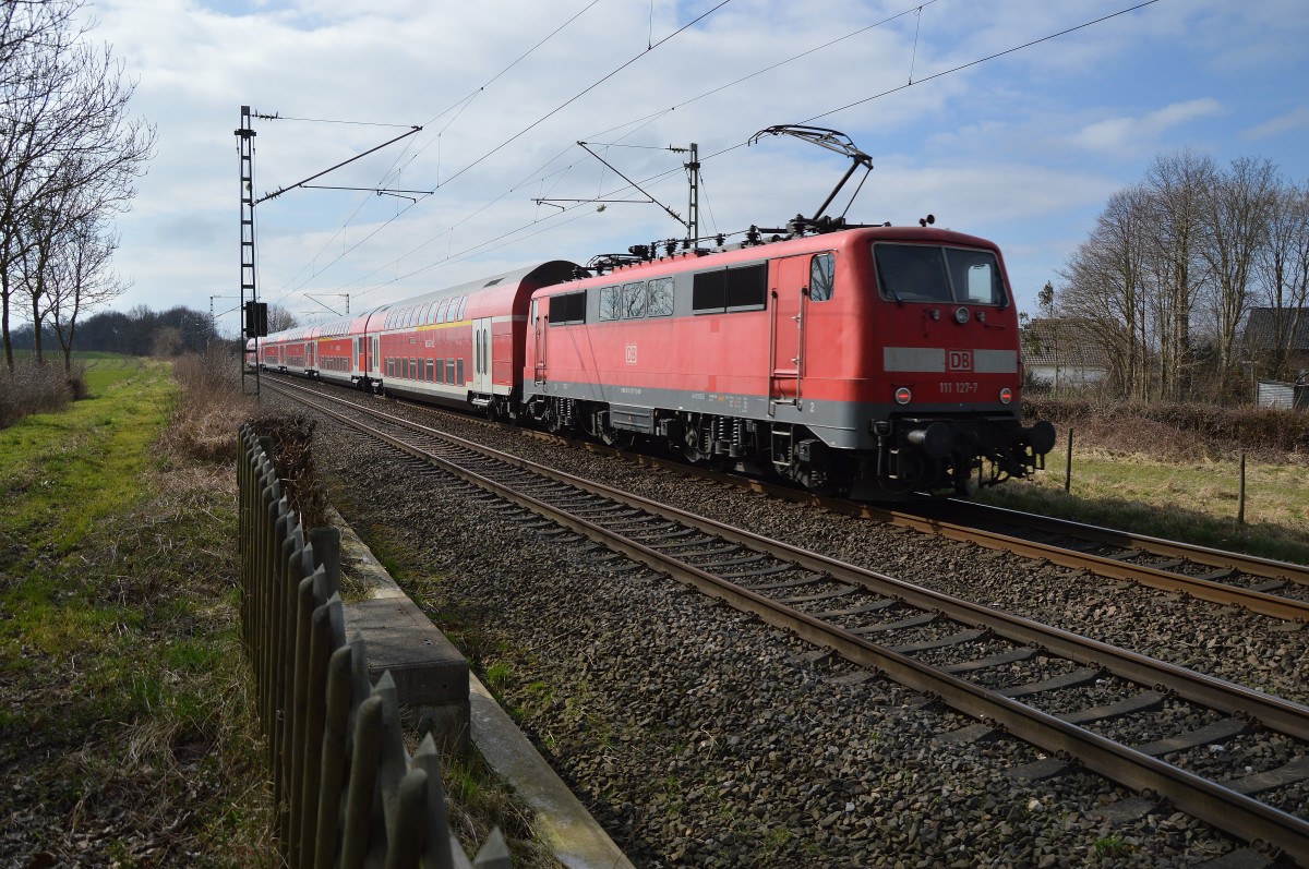 111 127-7 schiebt hier bei Würm einen RE4 nach Aachen Hbf am Sonntag den 22.3.2015.