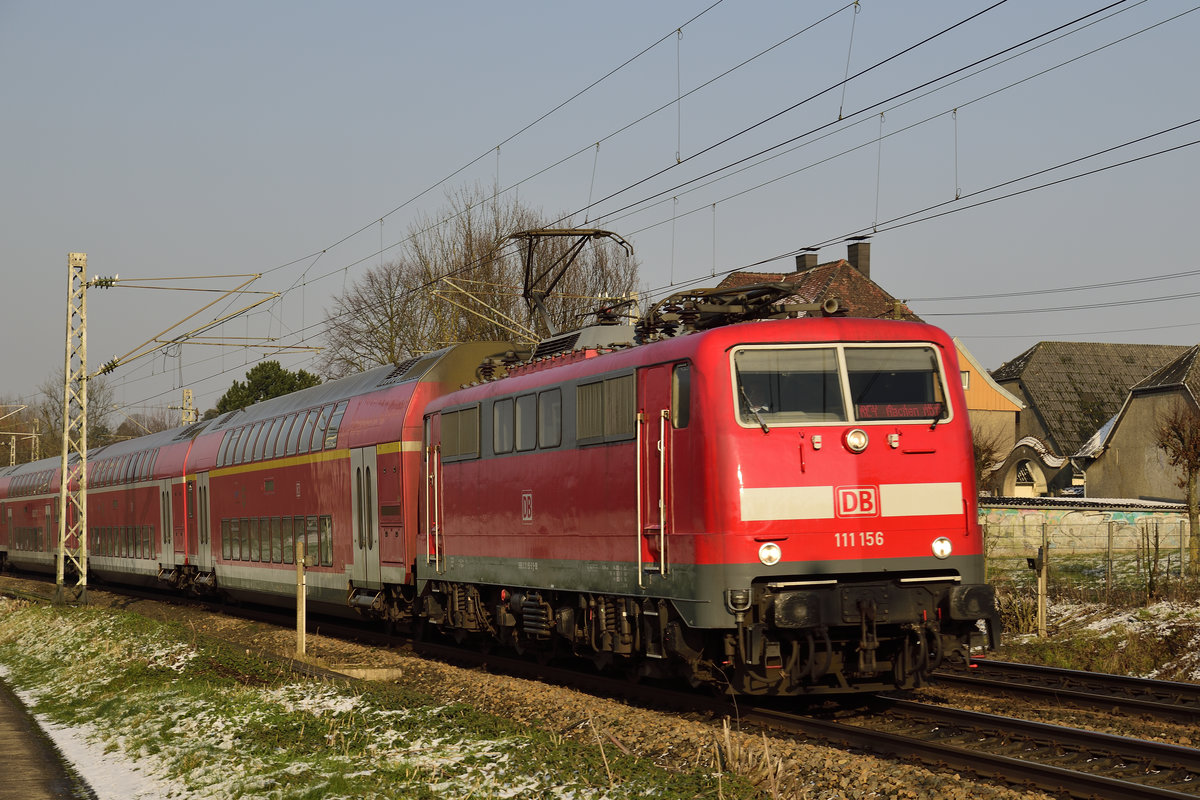 111 156, RE4 Wupper Express am 7.2.2018 auf der KBS 485 bei Übach-Palenberg in Richtung Aachen.
