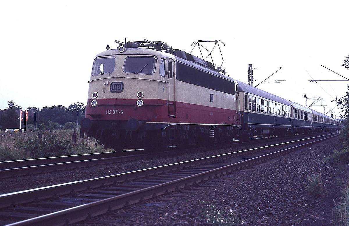 112311 mit Intercity 1530 Seeadler (nur freitags) am 25.7.1987 um 13.40 Uhr 
in Hasbergen nach Köln.