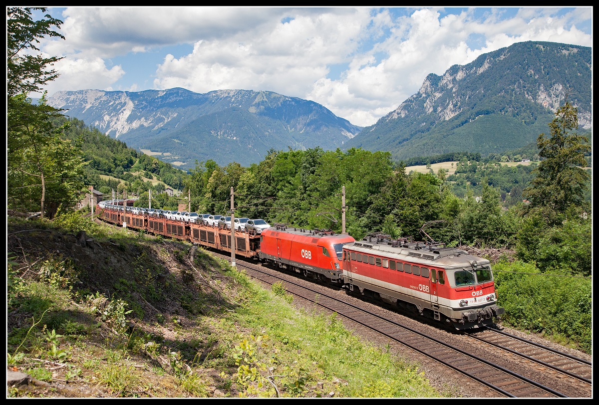 1142 583 + 1116 183 mit Güterzug bei Payerbach am 21.06.2018.