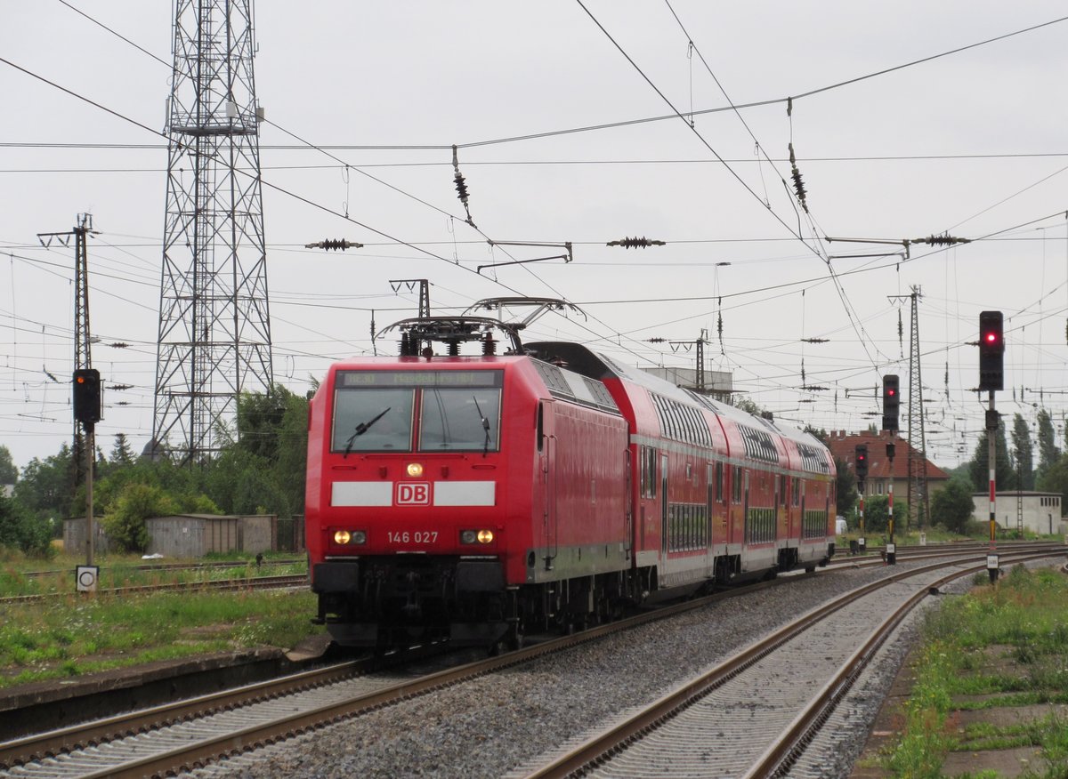 146 027 zieht am 03.August 2016 den RE 17628 nach Magdeburg Hbf durch Grokorbetha in Richtung Halle(Saale).