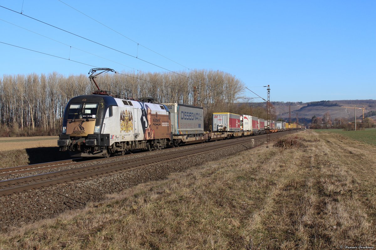 182 523 der TXLogistik mit einem KLV-Zug, bei herrlichem Kaiserwetter, fotografiert kurz vor Retzbach-Zellingen am 27.02.2019