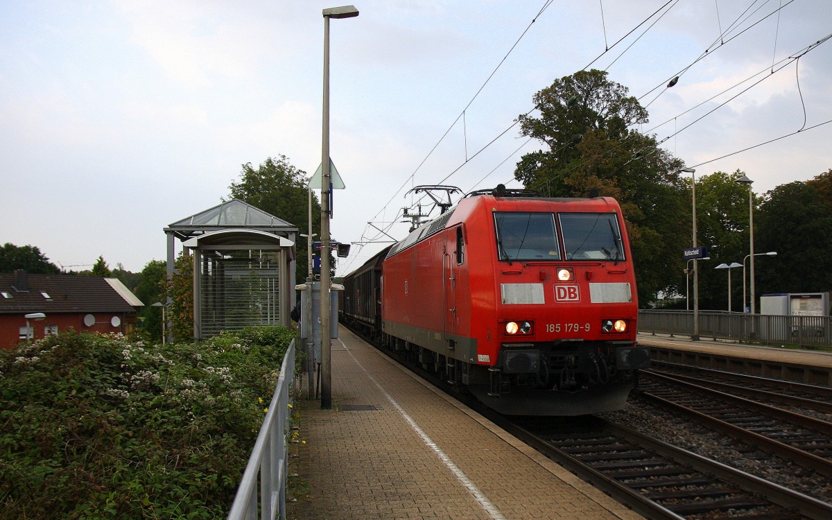 185 179-9 DB  kommt durch Kohlscheid mit einem langen gemischten Güterzug aus Osnabrück nach Kortenberg-Goederen(B) und fährt die Kohlscheider-Rampe hoch nach Aachen-West ujnd fährt in Richtung Richterich,Laurensberg,Aachen-West am 5.9.2014.