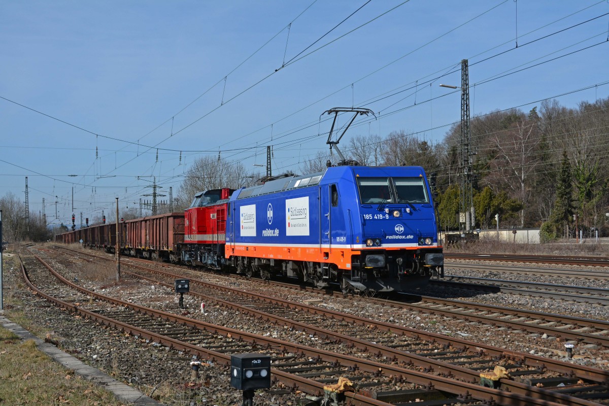 185 419 mit Adam20 bei der Einfahrt in den Bahnhof Süßen mit dem Sandzug.
Der Zug wurde in diesem Falle in Süßen geteilt und fuhr in 2 Etappen nach Amstetten(Württ.)17.3.2015.