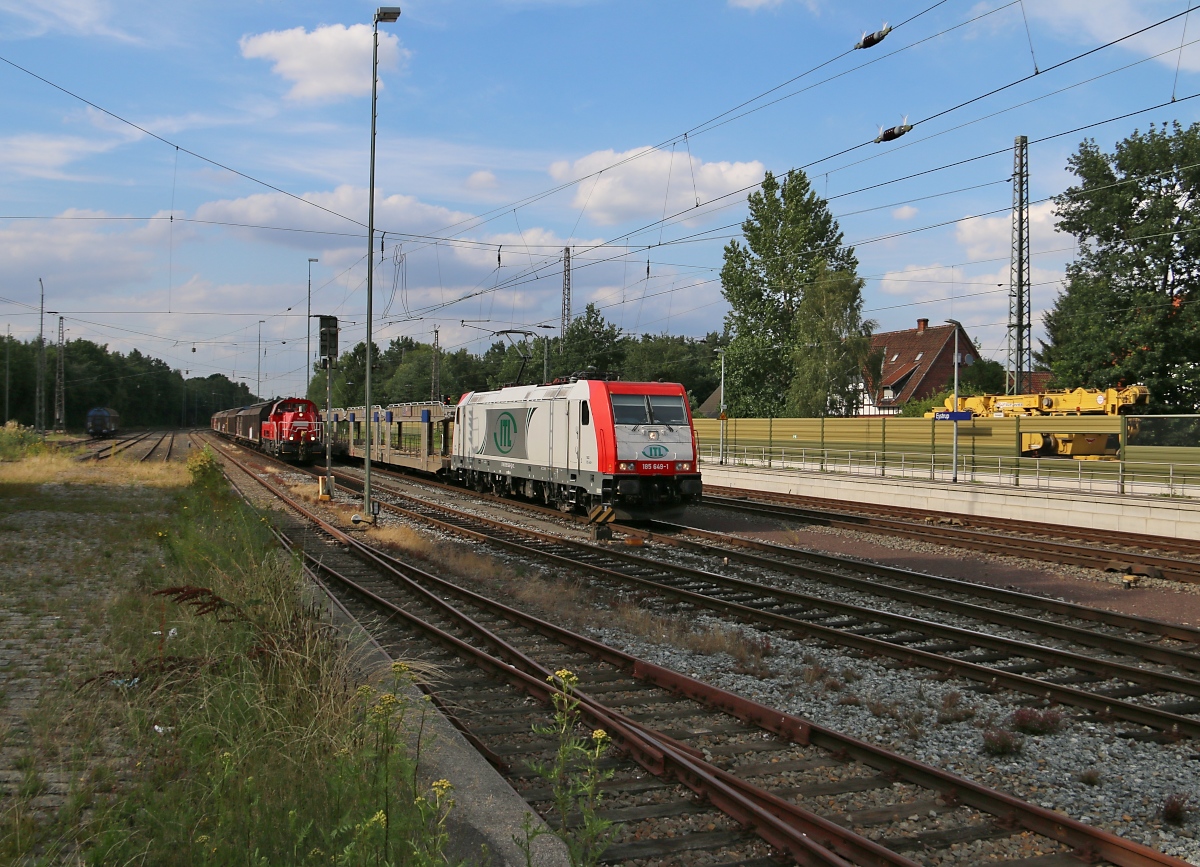 185 649-1 der ITL mit leeren Autotransportzug in Fahrtrichtung Nienburg(Weser). Aufgenommen am 22.07.2015 in Eystrup.