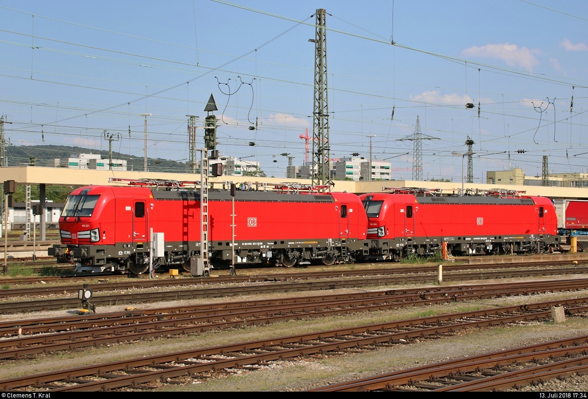 193 321-7 und 193 320-9 DB sind im Bahnhof Basel Bad Bf (CH) abgestellt.
Aufgenommen vom öffentlich zugänglichen Parkplatz neben der Schwarzwaldallee.
[13.7.2018 | 17:34 Uhr]