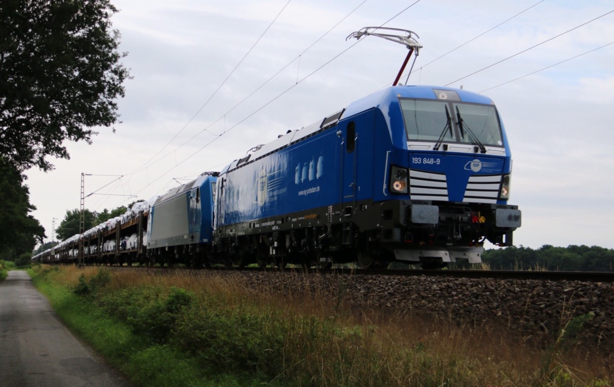 193 848 im frischen EGP Gewand mit 185 523 als Wagenlok und offenen ARS-Autotransportwagen in Fahrtrichtung Bremen. Aufgenommen am 22.07.2015 bei Eystrup.