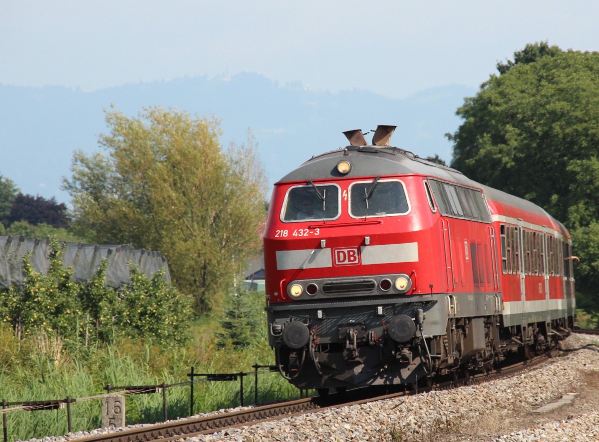 28.7.2014 Nonnenhorn. 218 432 mit RE nach Friedrichshafen im km 16.5