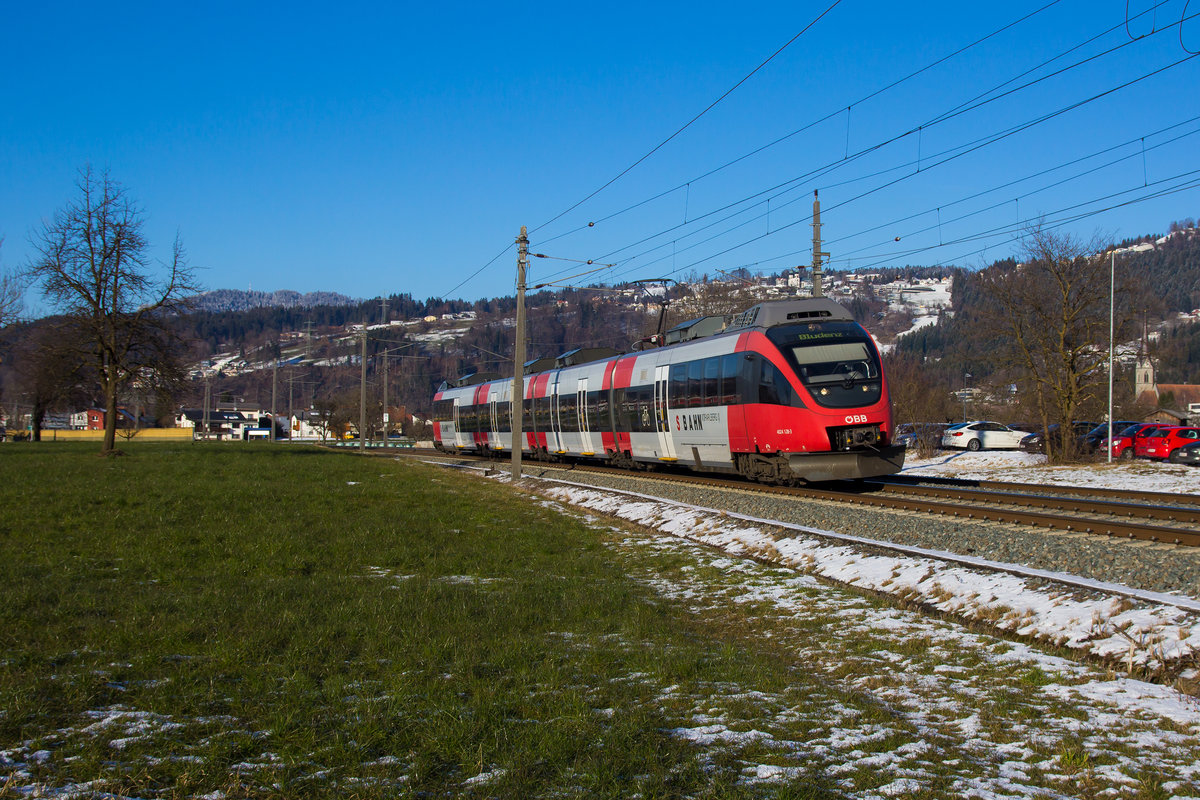 4024 128-3 als S-Bahn Richtung Dornbirn bei Schwarzach. 13.2.18