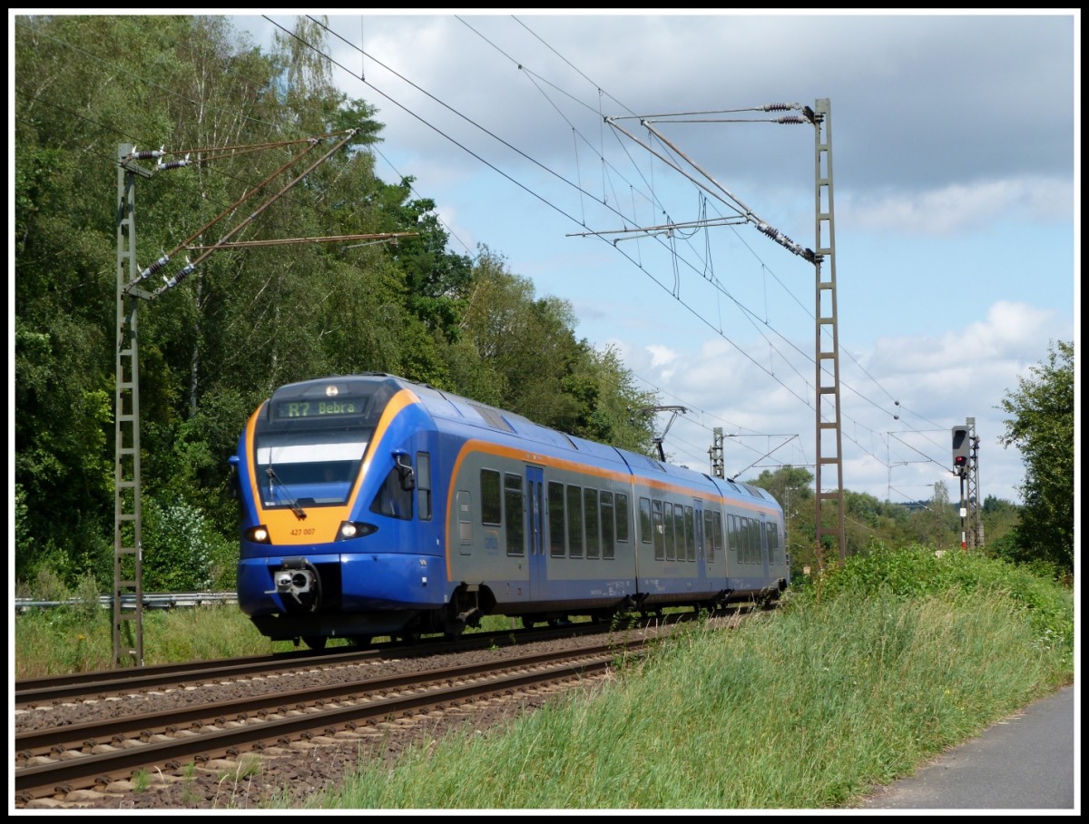 427 007 von cantus fährt am 14.8.14 als R7 nach Bebra.
Aufgenommen bei Wehretal - Reichensachsen.