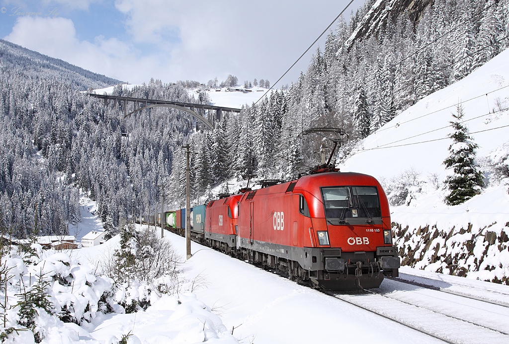 A pair of OBB class 1116 locomotives haul an intermodal train south through the Brenner Pass, pictured here approaching Sankt Jodok, 24 March 2014.
