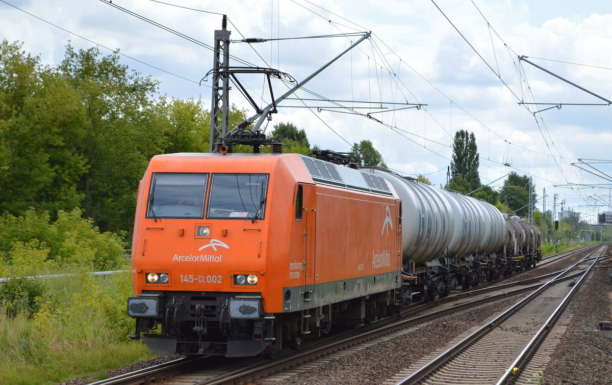 AMEH Trans - ArcelorMittal Eisenhüttenstadt Transport GmbH mit  145-CL 002  [NVR-Number: 91 80 6145 082-4 D-EKO] und einigen Kesselwagen am 11.07.18 Bf. Berlin-Hohenschönhausen.
