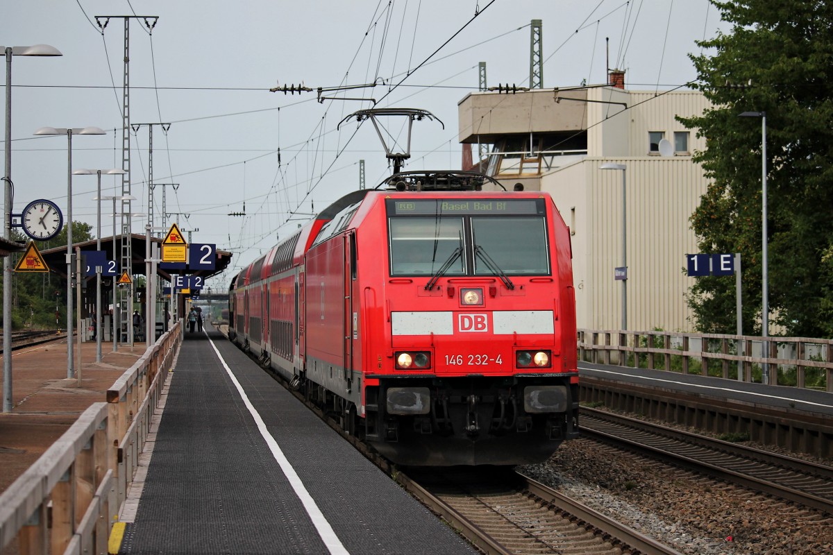 Ausfahrt am 25.07.2014 von der Freiburger 146 232-4 mit einer RB (Offenburg - Basel Bad Bf) in Müllheim (Baden) gen Auggen.