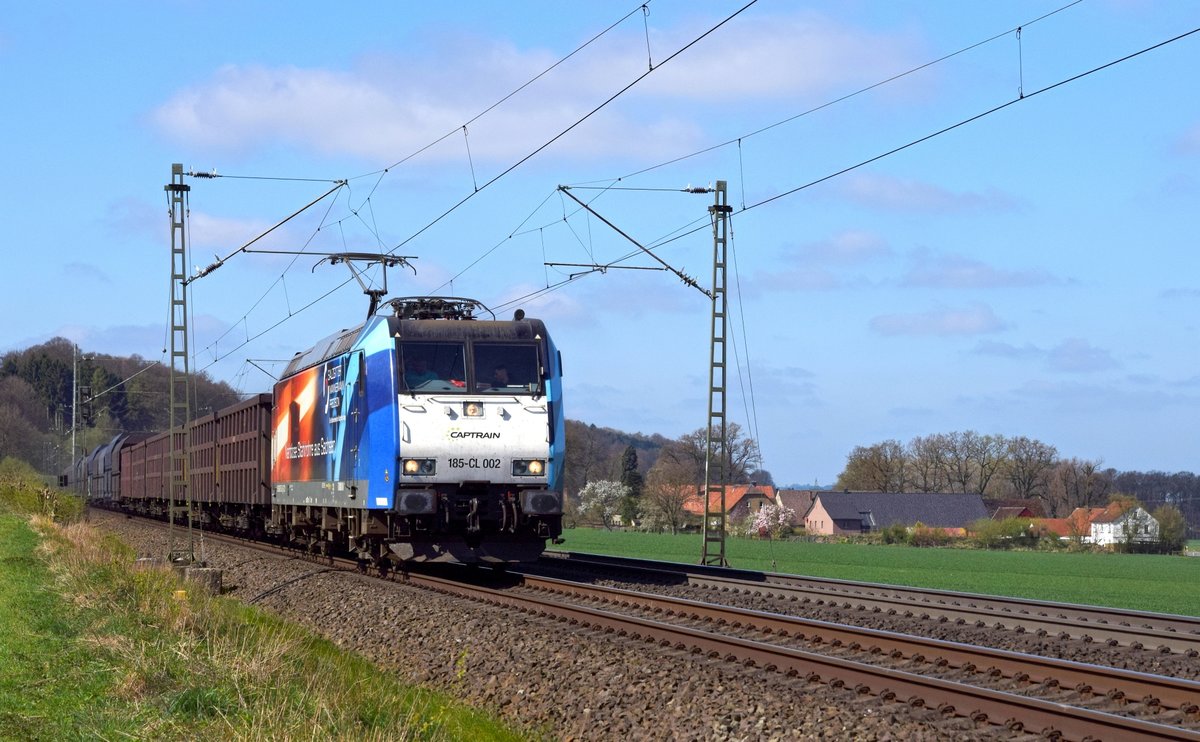 BRLL 185-CL 002 (185 502)  Salzgitter Mannesmann Precision , vermietet an Captrain, ist mit einem Kokszug am 03.04.17 zwischen Bohmte und Ostercappeln auf dem Weg von Bottrop nach Bremen.