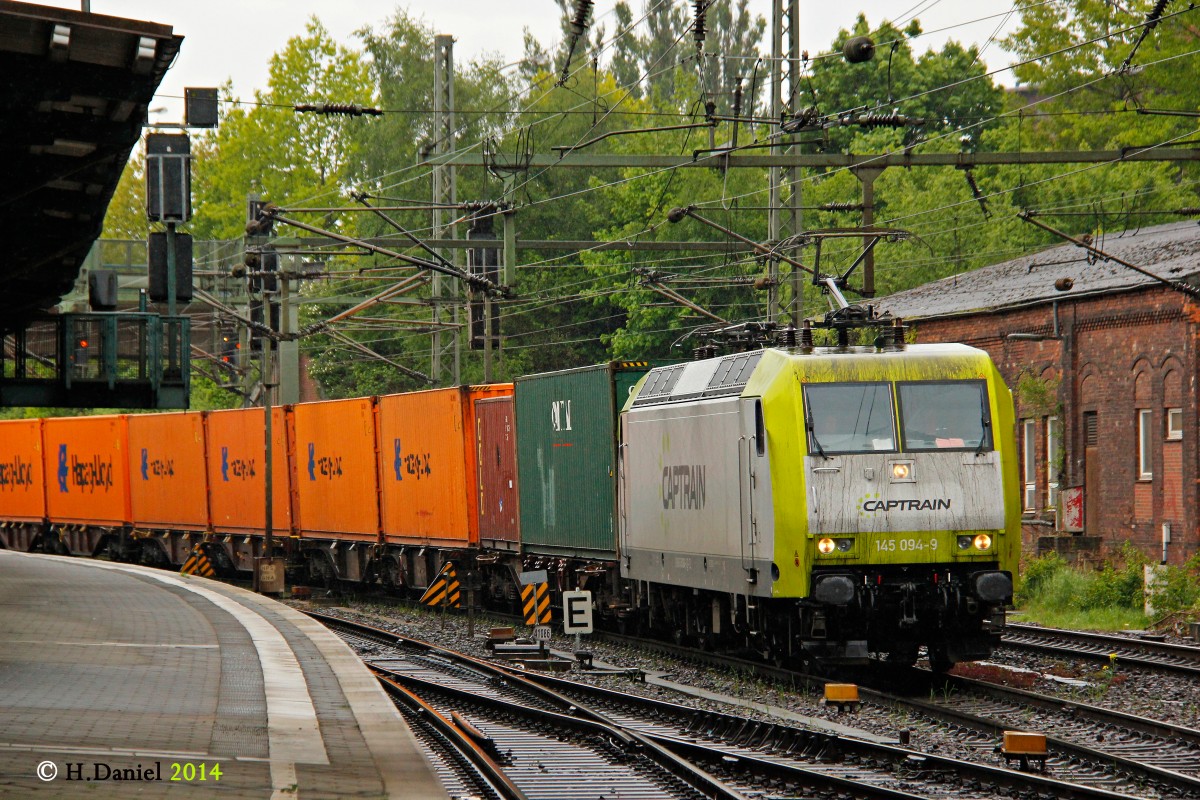 Captrain 145 094-9 mit einem Containerzug am 07.05.2014 in Hamburg Harburg.