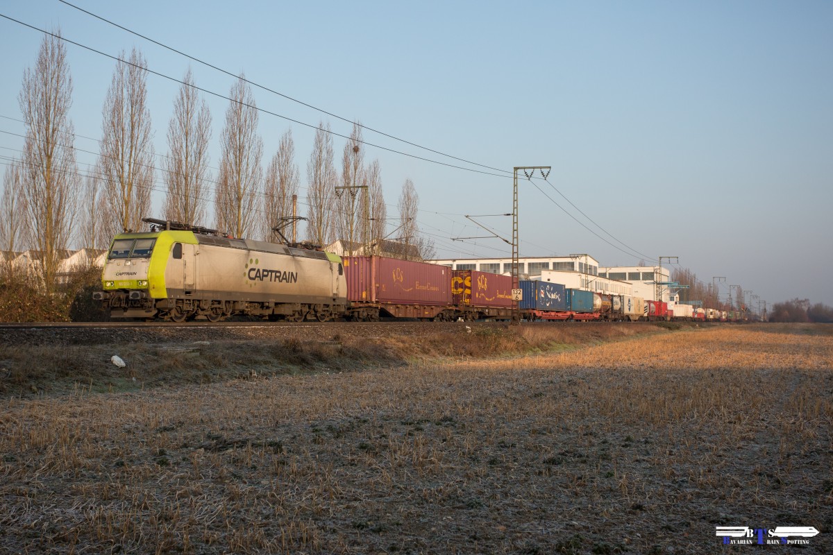 Captrain 185 550-1 mit Containerzug am 18.03.16 in Burgweinting 