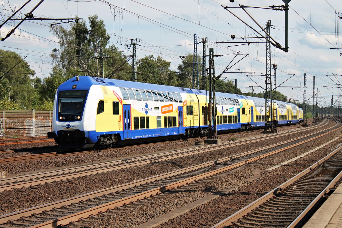 D-ME 55 80 86-73 204-4 am 13.08.2014 an der Spitze eines metronom Leerzug nach Hamburg Hbf bei der Einfahrt in Harburg. Schlusslok an diesem Tag war 146 534-3.