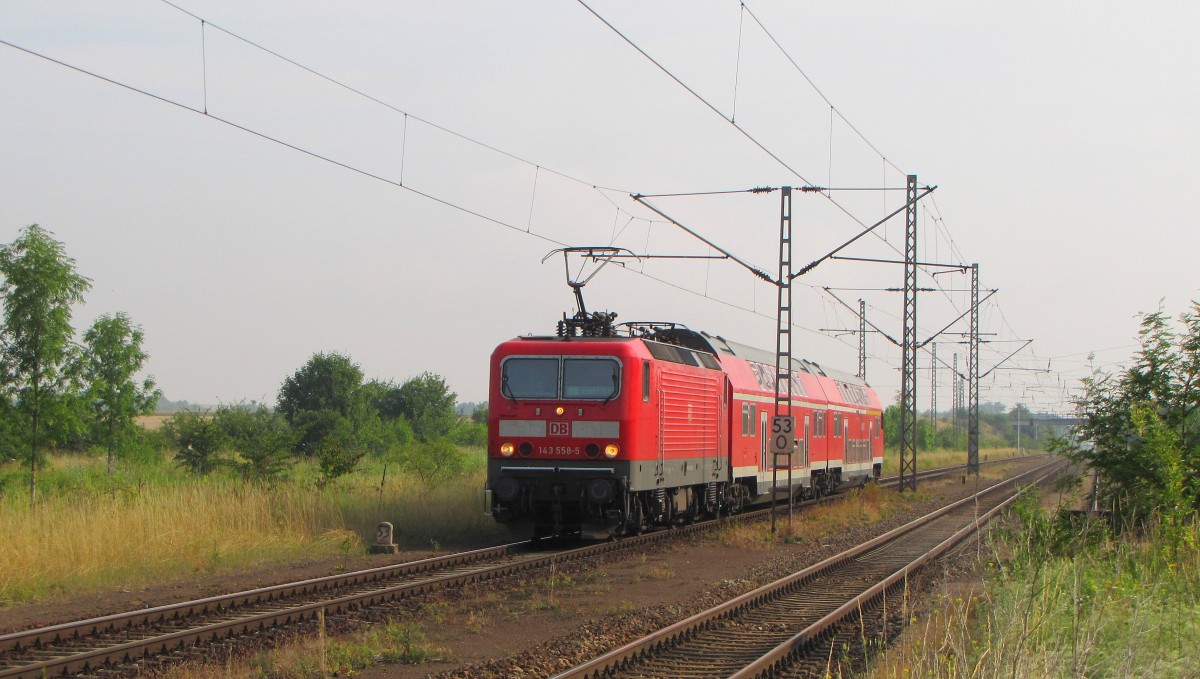 DB 143 558-5 mit der RB 16393 von Sömmerda nach Erfurt Hbf, am 11.07.2014 in Großrudestedt.