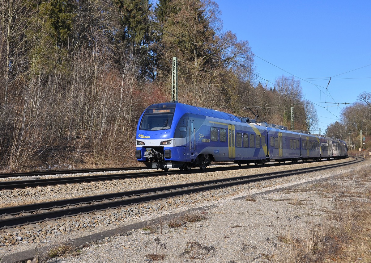 Der Meridian Flirt Triebzug ET 322 ist mit dem M 79015 nach Salzburg HBF unterwegs.Aufgenommen im Bahnhof Aßling Obb.am 6.2.2014.
