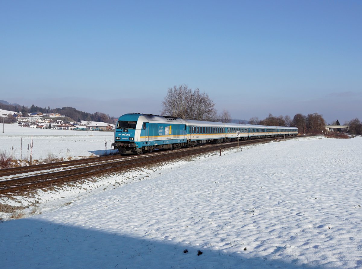 Die 223 069 mit einem ALX nach Lindau am 15.12.2018 unterwegs bei Flecken.