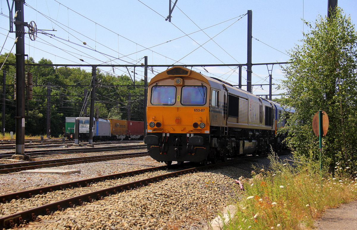 Die Class 66 653-07 beide von HSL steht auf dem Abgstellgleis in Montzen-Gare(B). Aufgenommen in Montzen-Gare(B). Bei Sommerwetter am Nachmittag vom 15.7.2018.