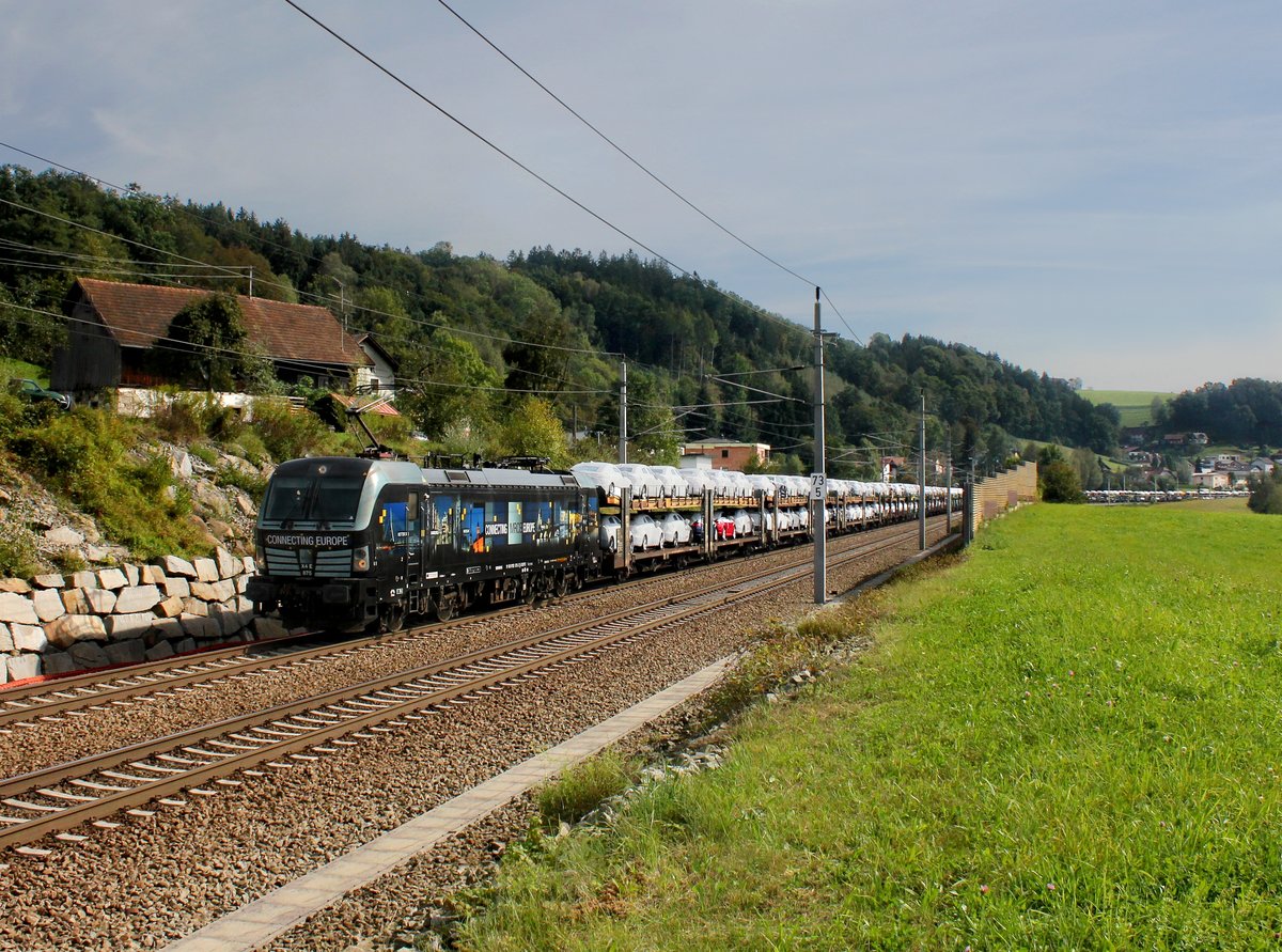 Die X4E-875 mit einem Autozug am 23.09.2016 unterwegs bei Wernstein.