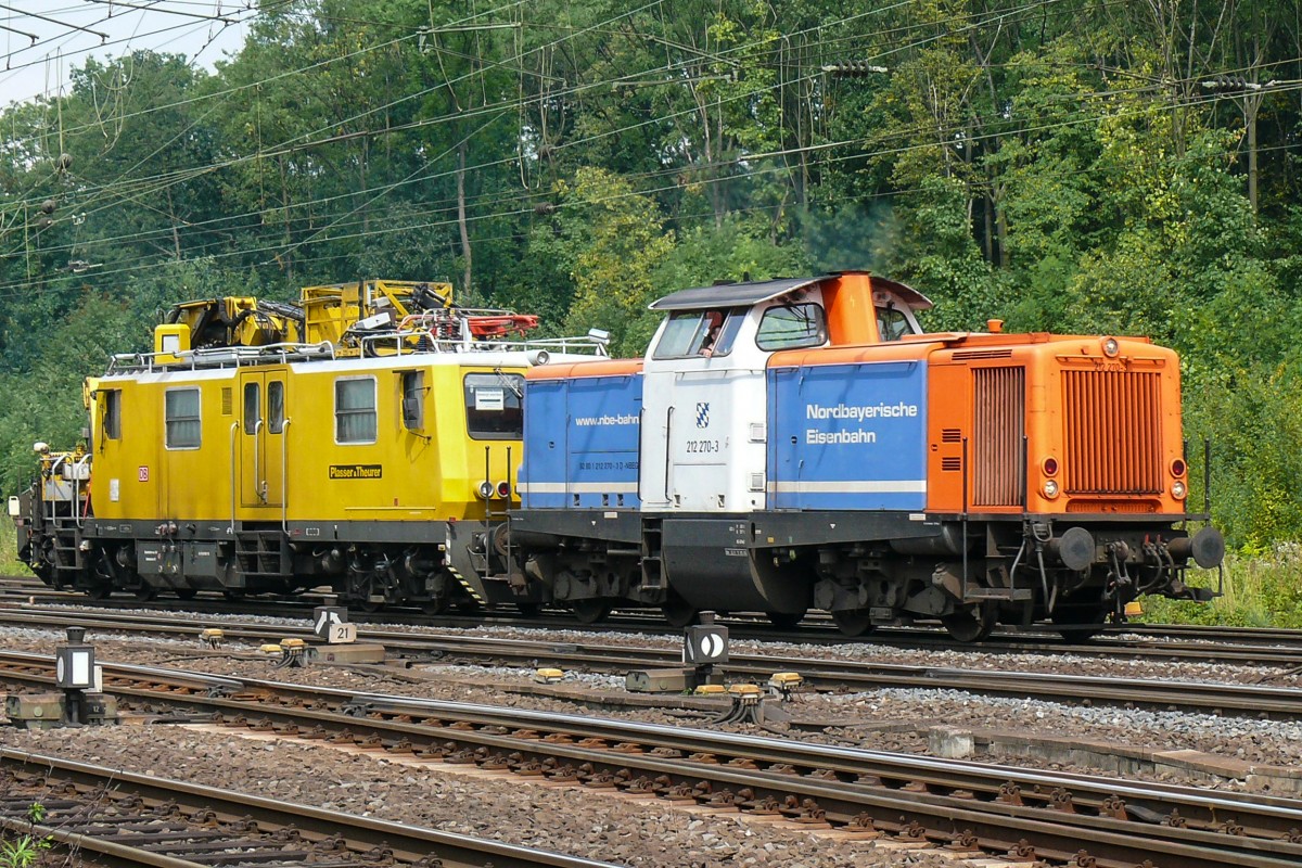 Dieses Gespann mit der 212 270-3 der NBE (Nordbayerische Eisenbahn) fuhr am 14/08/2009 durch Köln-Gremberg.