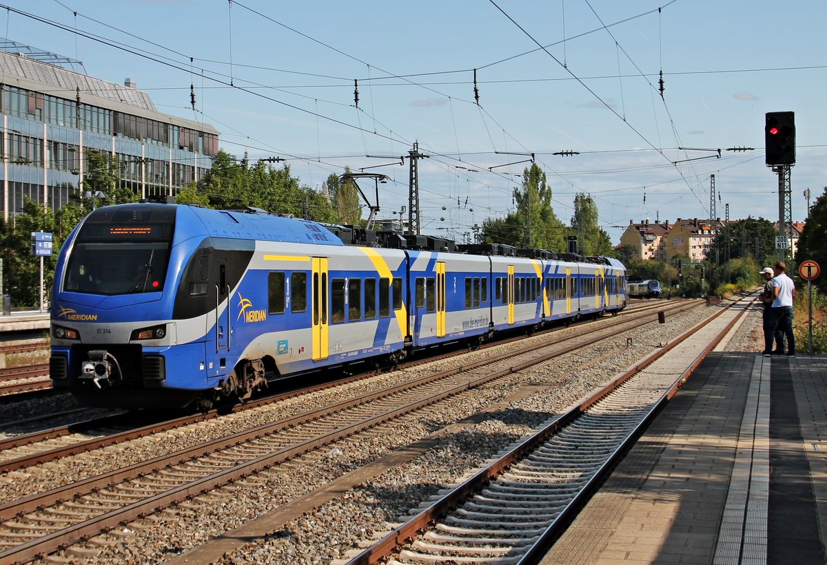 Durchfahrt am 25.08.2015 von Meridian ET 314 (1430 014-9/1430 514-8) als Werkstattfahrt in München Heimeranplatz gen München Laim.