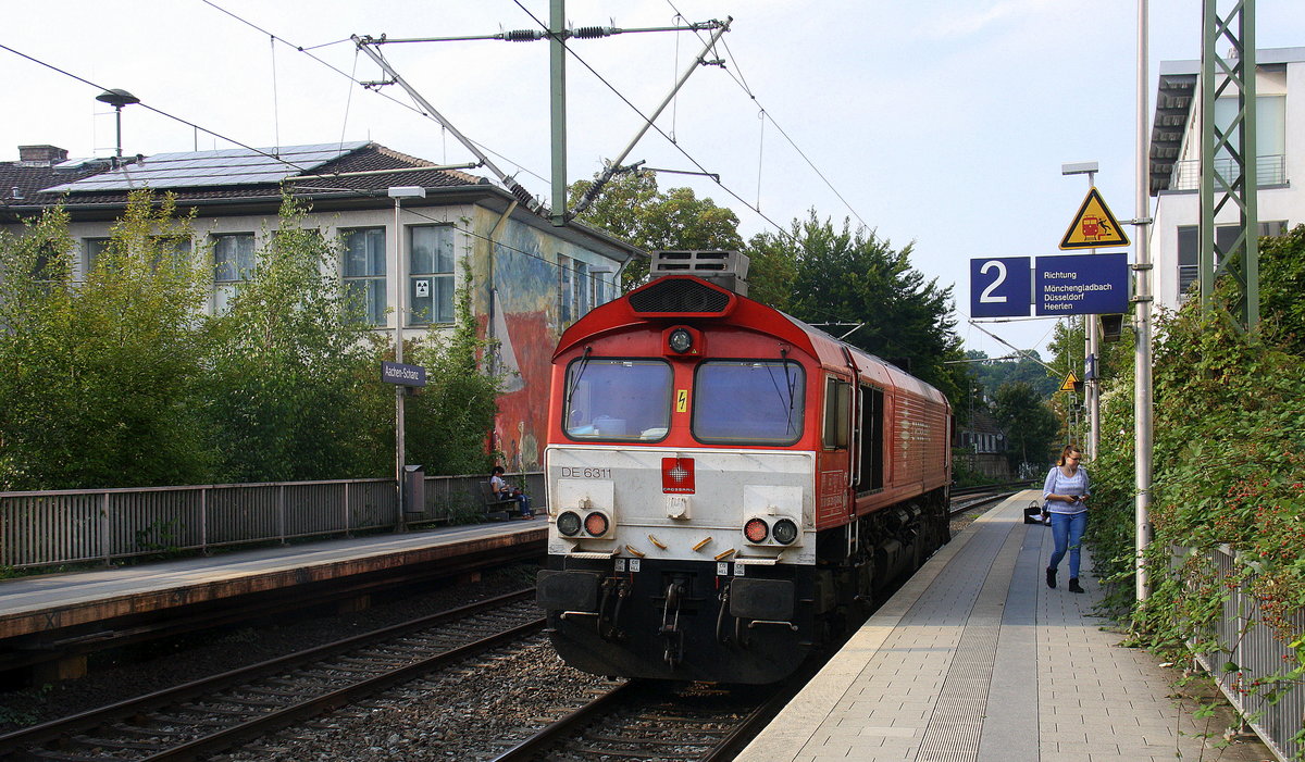 Ein Nachschuss von der Class 66 DE6311   Hanna  von Crossrail  kommt als Lokzug aus Köln nach Aachen-West und fuhr durch Aachen-Schanz in Richtung Aachen-West. 
Aufgenommen vom Bahnsteig von Aachen-Schanz.
Bei Sommerwetter am Nachmittag vom 26.8.2017. 