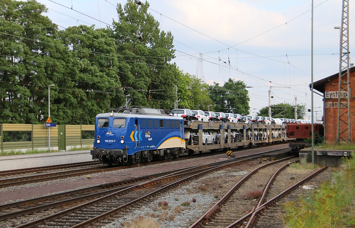 EVB 140 870-7 mit beladenem Autotransportzug in Fahrtrichtung Verden(Aller). Aufgenommen am 22.07.2015 in Eystrup.