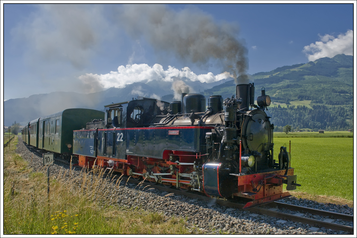 Ex. SKGLB 22 (Aquarius C) mit dem Sommernostalgiezug 3390 von Zell am See nach Krimml, aufgenommen am 20.6.2018 in Piesendorf.