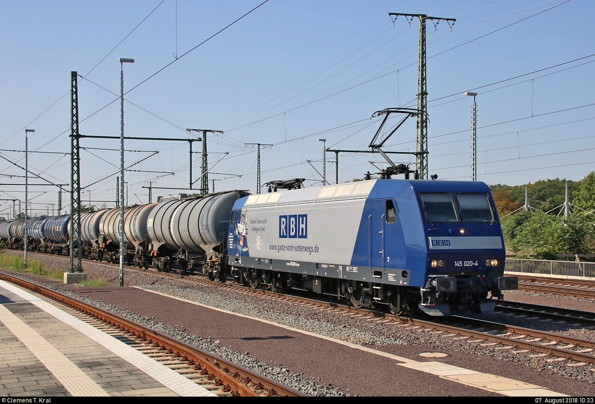 Kesselzug mit 145 020-4  www.ganz-vorn-unterwegs.de  der RBH Logistics GmbH durchfährt Magdeburg Hbf in nördlicher Richtung.
[7.8.2018 | 10:33 Uhr]