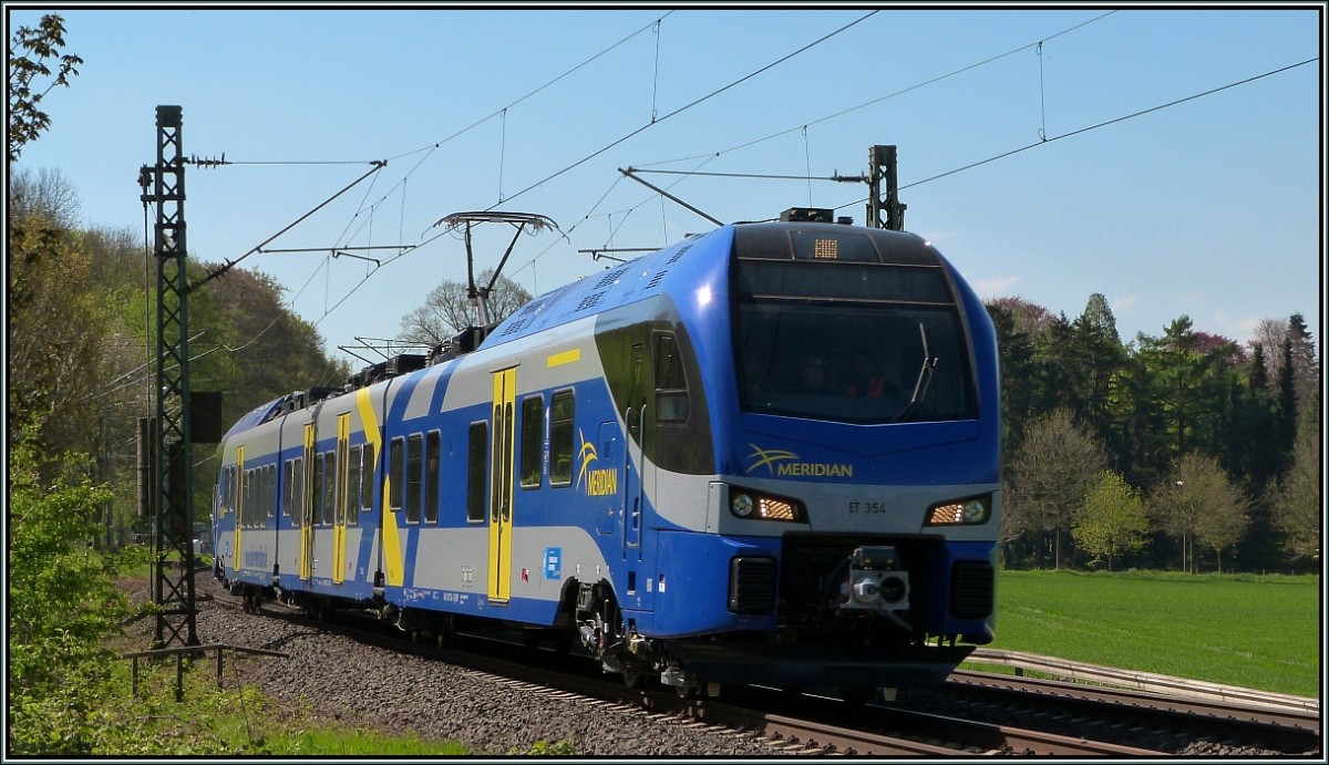 Meridian auf Abwegen! Die ET 354 im Gleisbogen bei Rimburg auf der Kbs 485 am 16.April 2014.
