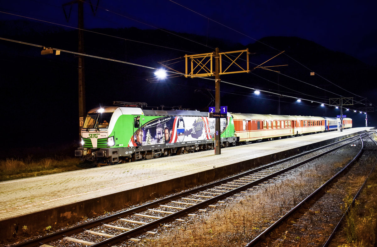 Moderne trifft Historik - Vectron trifft Schlieren

ELL 193 219-3  Stille Nacht , der SETG, hält mit dem SR (Lienz - Graz Hbf), im Bahnhof Greifenburg-Weißensee.
Aufgenommen am 8.12.2018.