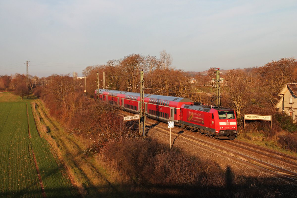 Nachschuss auf 146 111-0  Baden Württemberg erfahren , als sie ihren RE (Basel Bad Bf - Offenburg) in den Bahnhof von Müllheim (Baden) schob.
