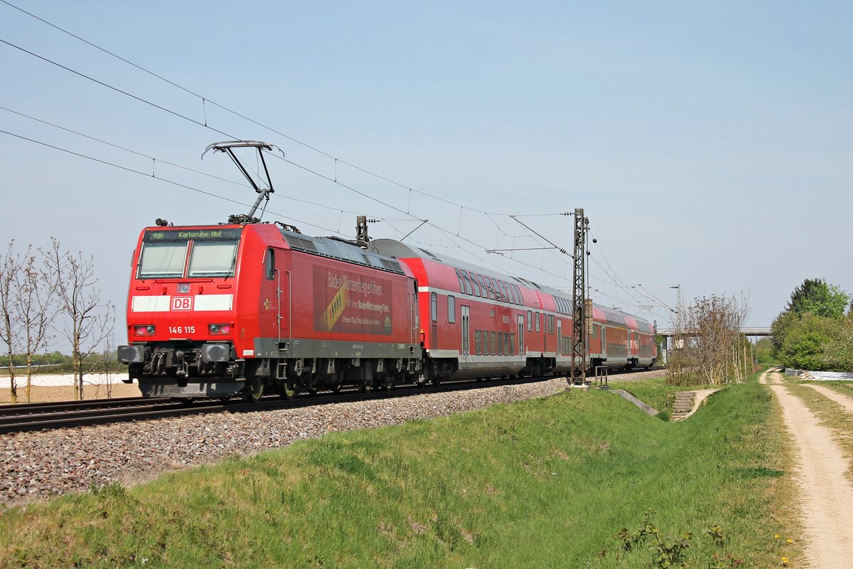 Nachschuss auf 146 115  Baden Württemberg erfahren/Landkreis Breisgau-Hochschwarzwald  am 11.04.2017, als sie bei Hügelheim im Markgräflerland ihren RB nach Karlsruhe Hbf gen Buggingen schob.