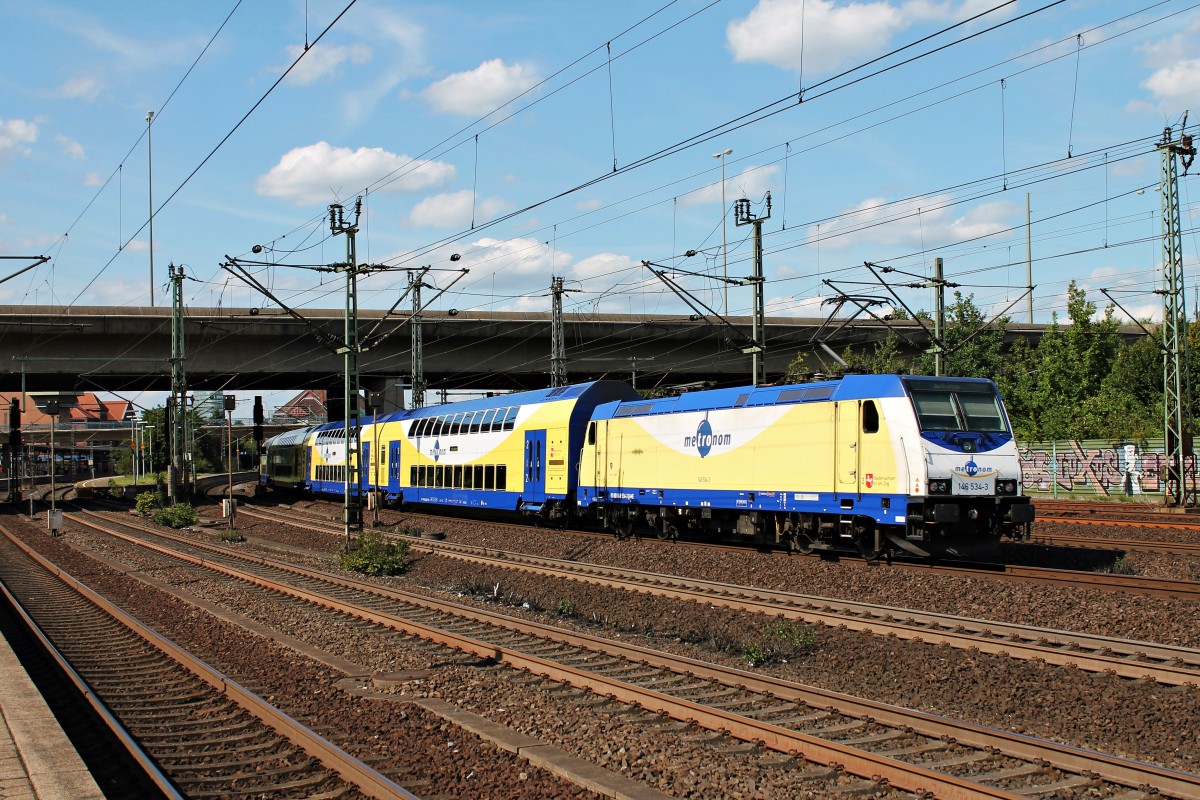 Nachschuss auf 146 534-3 mit einem metronom Leerzug am 13.08.2014 bei der Durchfahrt in Hamburg Harburg.