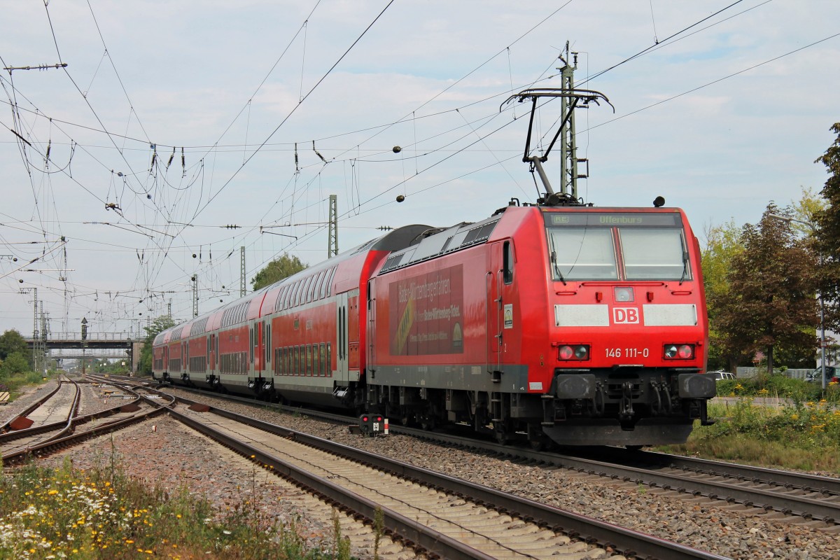 Nachschuss auf die Ausfahrende 146 111-0 mit einem RE (Schliengen - Offenburg) am 05.09.2014 in Müllheim (Baden) gen Norden.