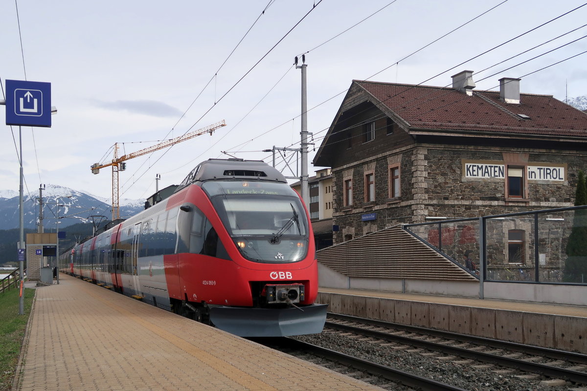 ÖBB 4024 093-9 und eine weitere 4024 durchfährt als REX den Bahnhof Kematen in Tirol. Aufgenommen 11.4.2018.