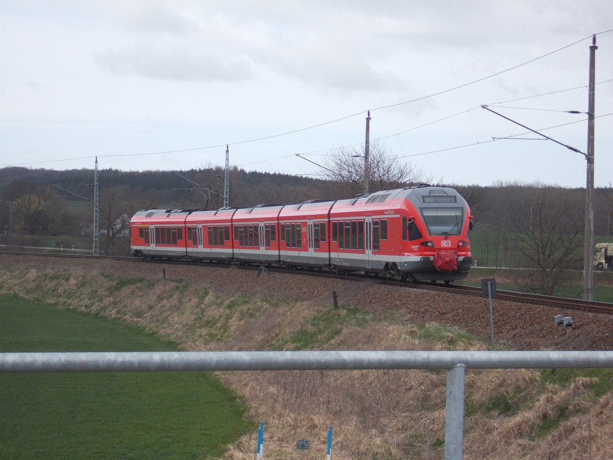 RE 13162 Sassnitz-Lietzow,am 13.April 2015,gefahren von 429 028,bei Borchtitz.